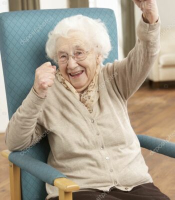 https://it.depositphotos.com/11881308/stock-photo-senior-woman-celebrating-in-chair.html