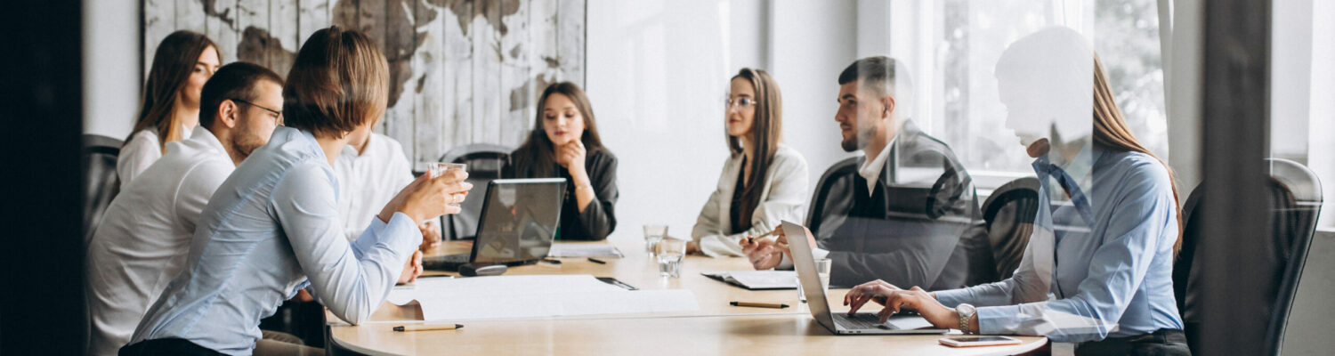 Group of people working out business plan in an office